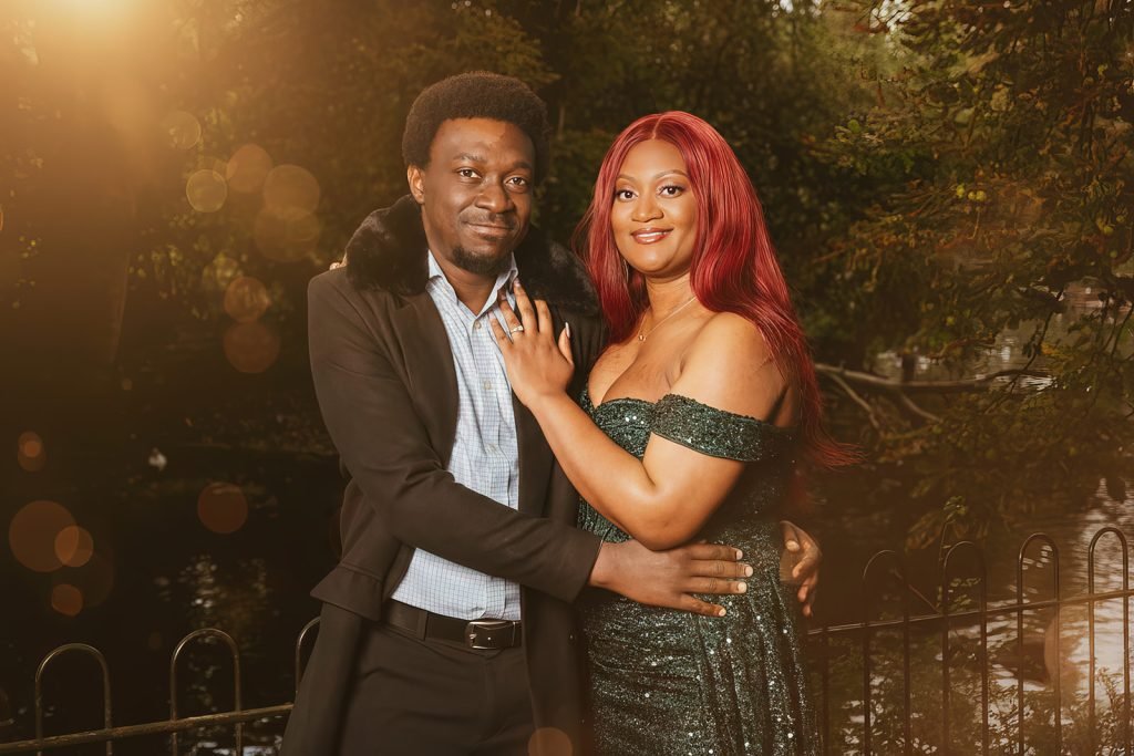 Couple embracing in golden hour light.